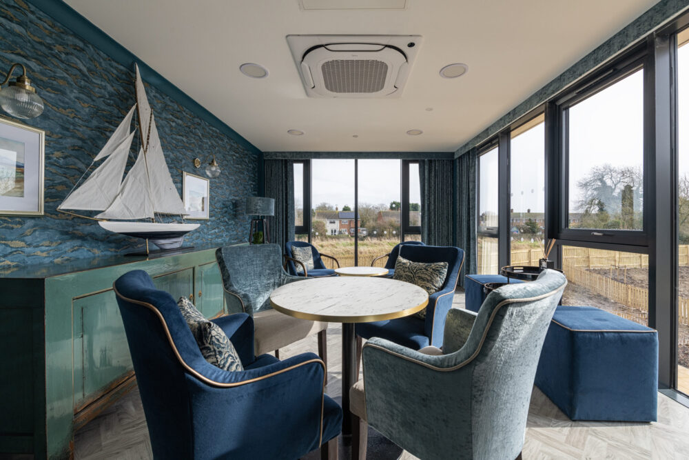 Themed lounge with garden views at Humberston House